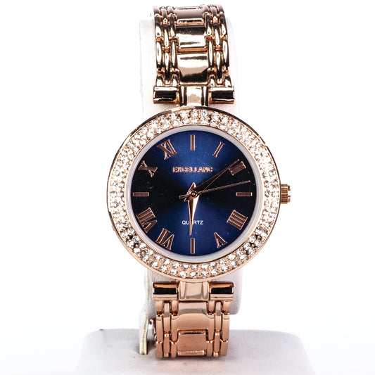 Dámské hodinky Excellanc v barvě růžového zlata s kovovým náramkem a černým ciferníkem.
