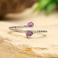 Stříbro 925/1000 - Prsten s Brazilským Ametystem a Bílým Topazem - Karátové číslo: 0.41. přibližná hmotnost: 1.58 gramů