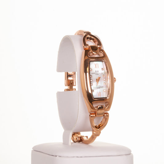 AW dámské hodinky v barvě růžového zlata s trojúhelníkovým řemínkem a krystaly křemenu